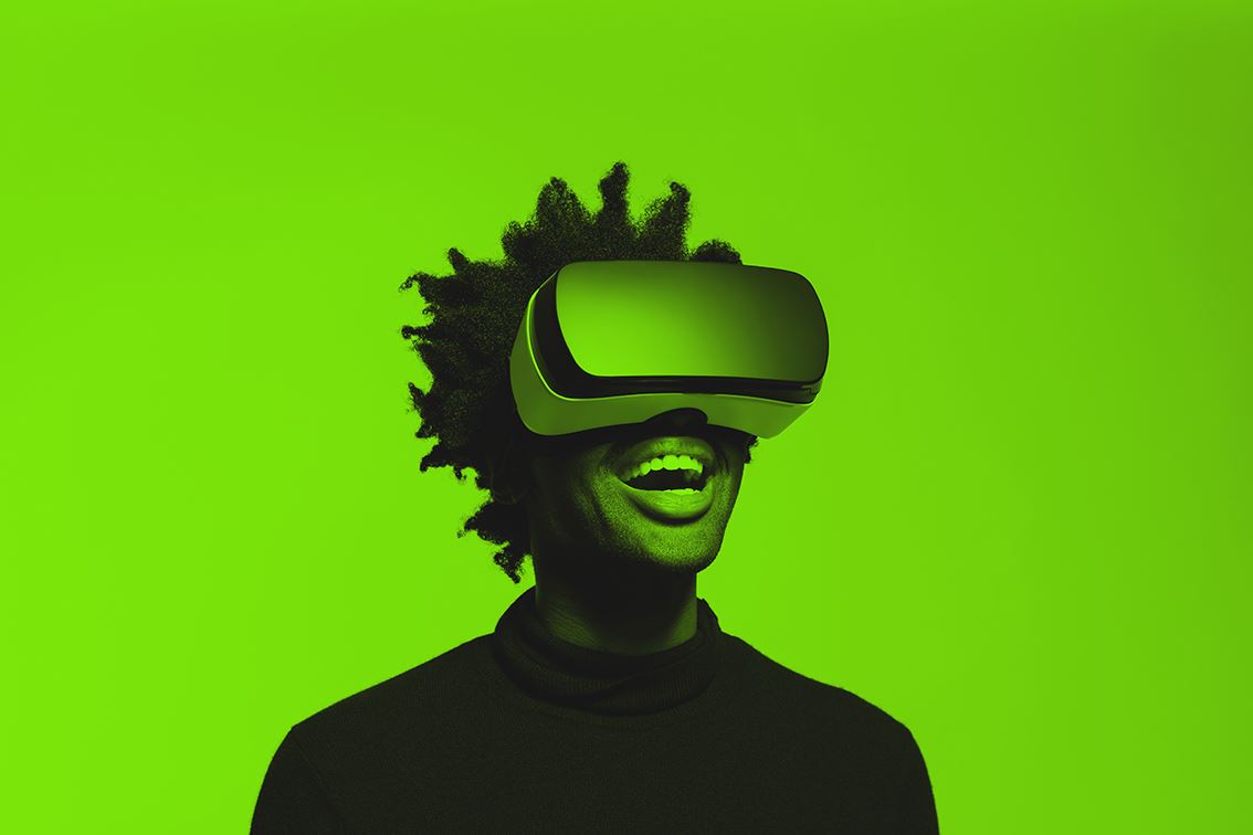 Woman-wearing-a-VR-headset-with-a-green-overlay.jpg